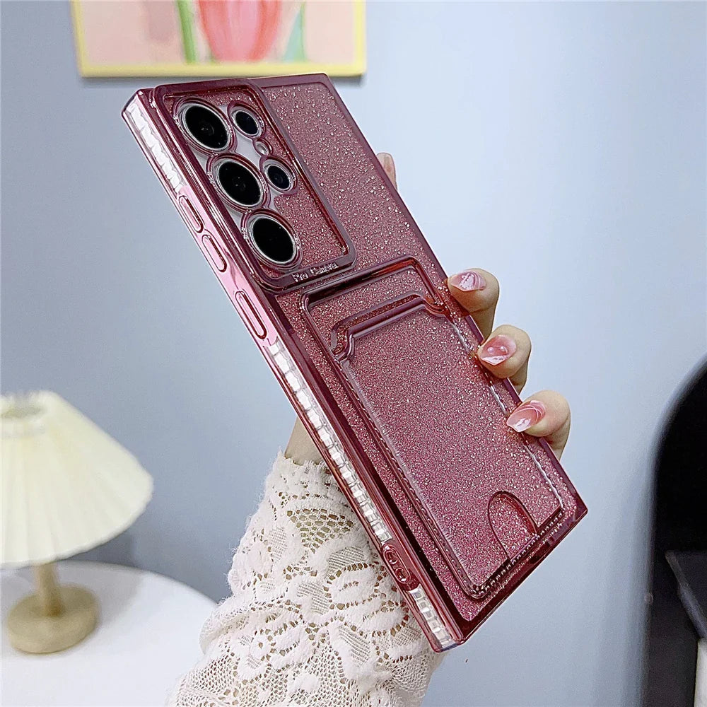 Glittery pink phone case with a camera protector and card slot.