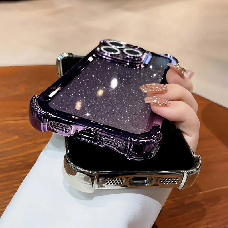 A glittery purple smartphone case with a clear, reinforced bumper and decorative camera rings.