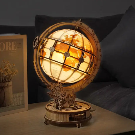 a table lamp with a globe on top