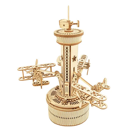 a gold model of a flying machine