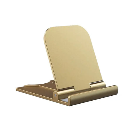 a gold phone stand with a white background