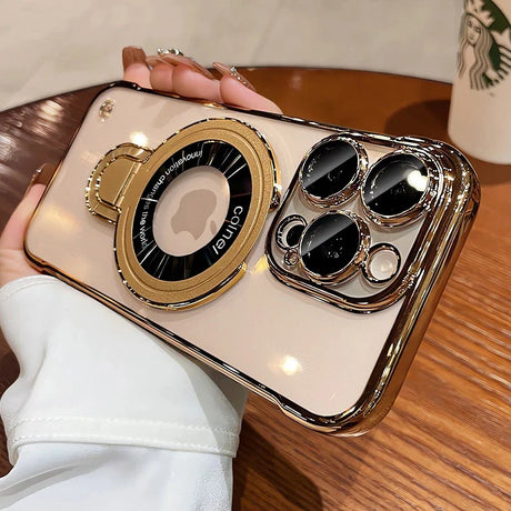 Gold-trimmed phone case with camera lens protectors and rotating ring stand.