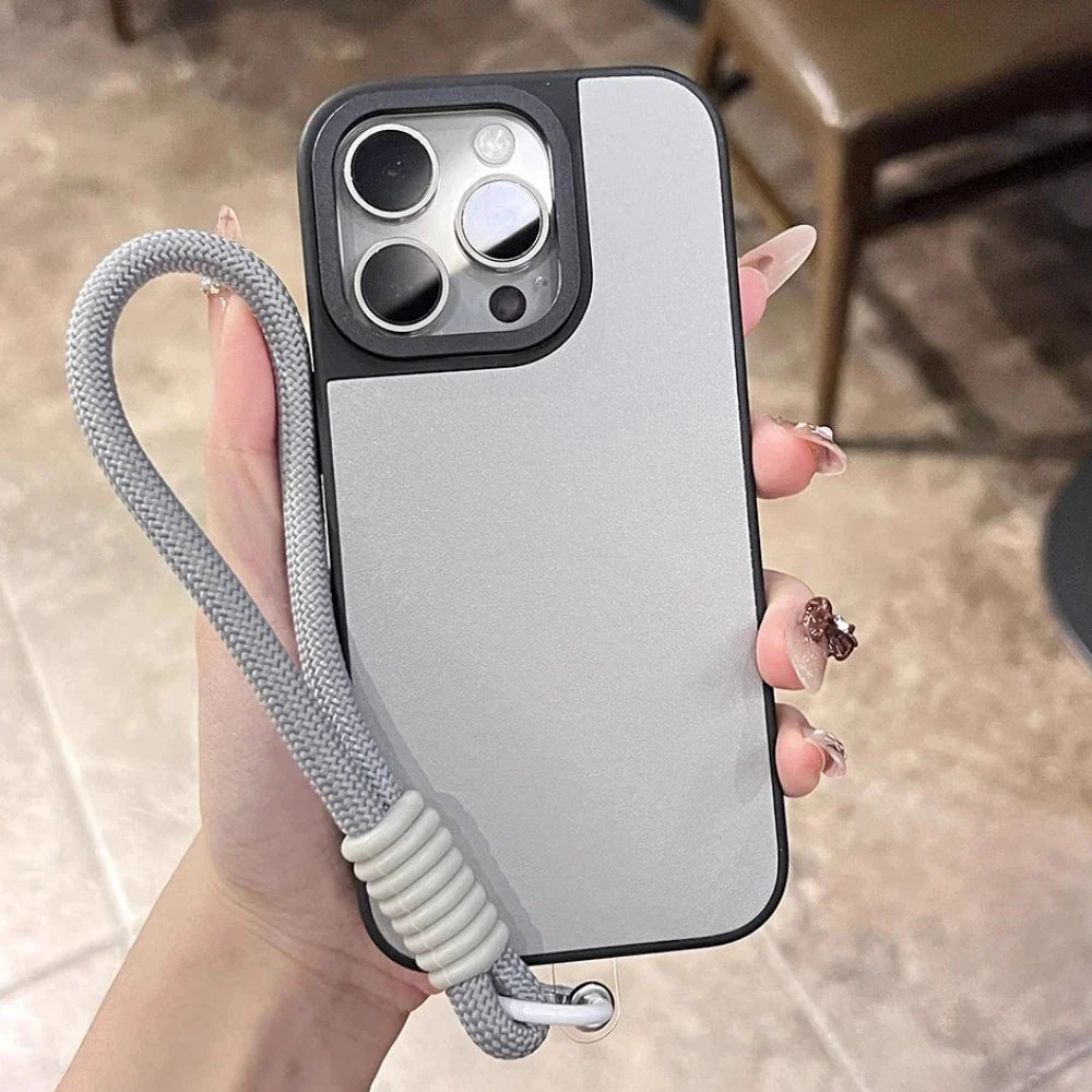 Gray and black phone case with wrist strap.