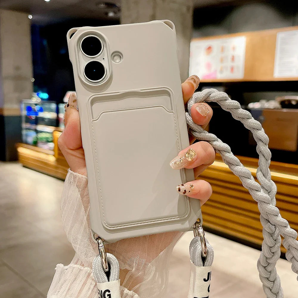 Gray phone case with card holder and braided strap.