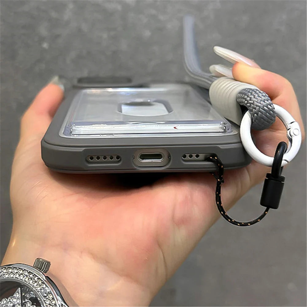 Gray phone case with lanyard.
