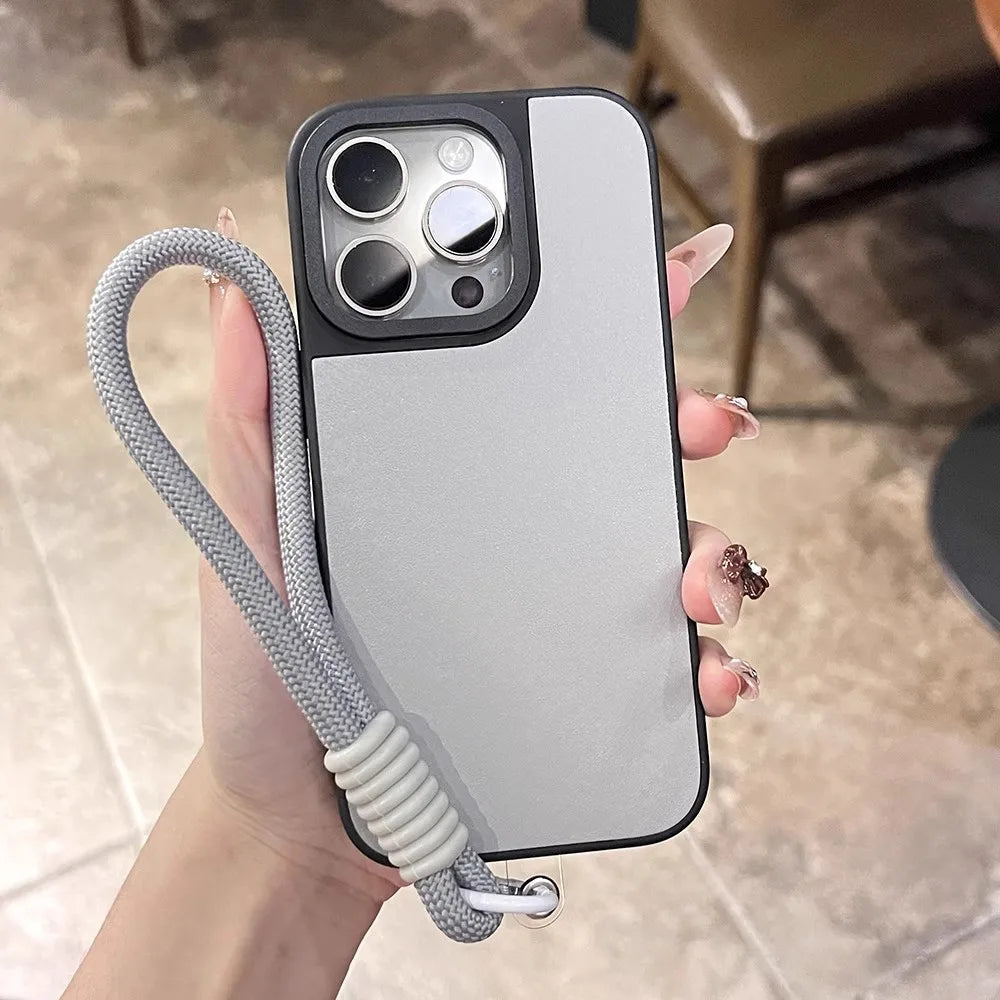 Gray phone case with wrist strap.