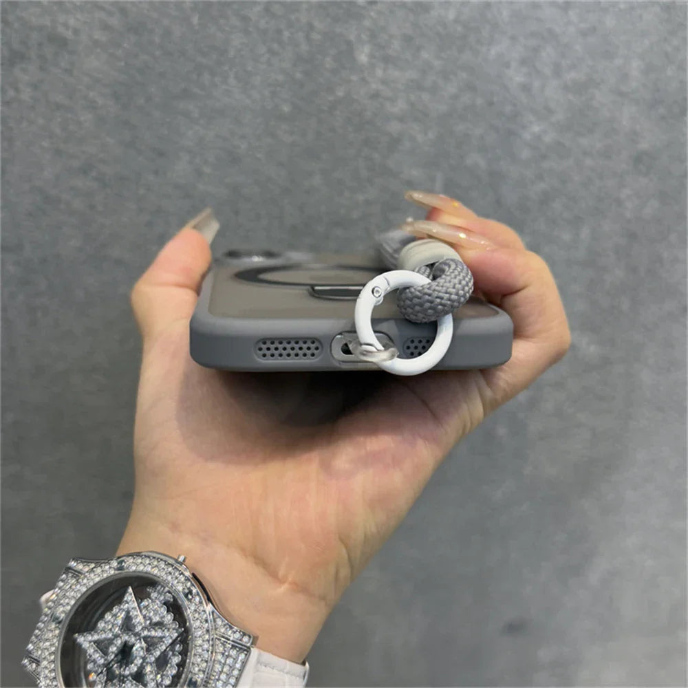 Gray phone case with wrist strap.