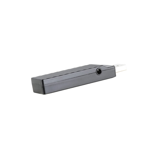 Gray rectangular electronic device with a small circular opening on one end and a thin cable attached.