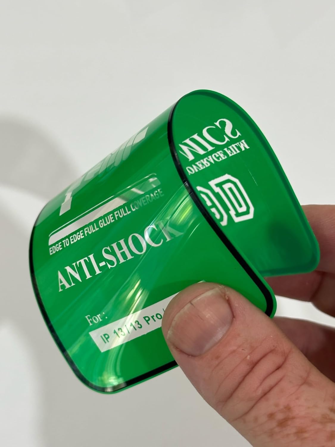 Green anti-shock phone screen protector.