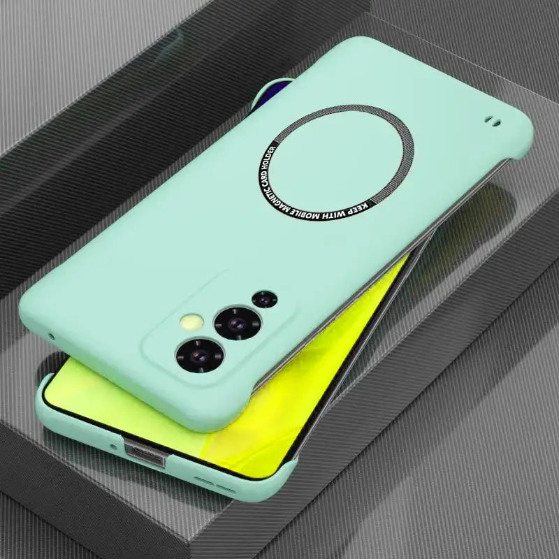 the back of a green phone case with a yellow phone