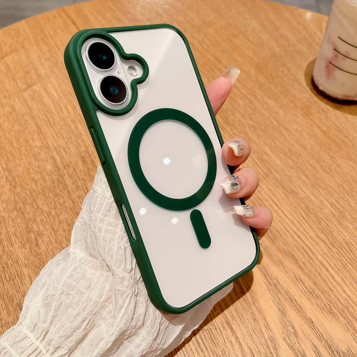 Green-trimmed clear phone case with magnetic ring.