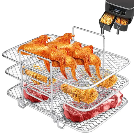 a grill basket with chicken wings and a fryer