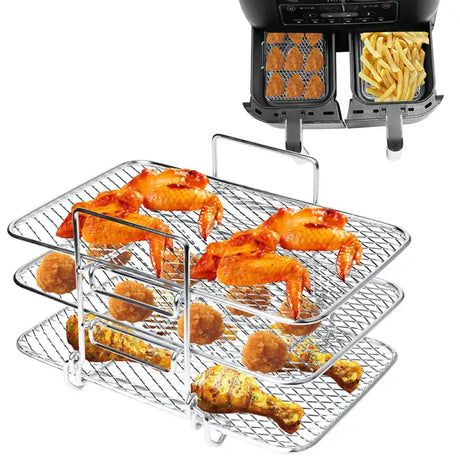 a grill with chicken and french fries on it