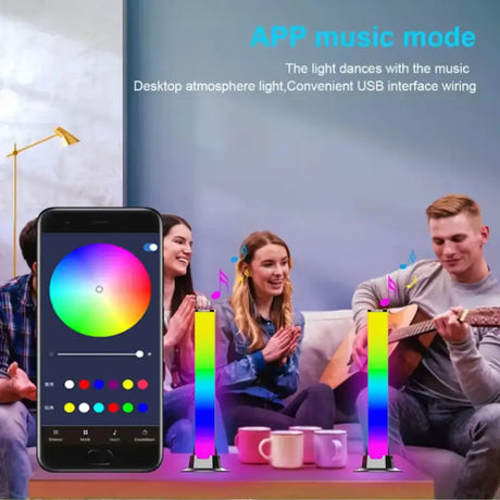 A group of people sitting around a table with a phone