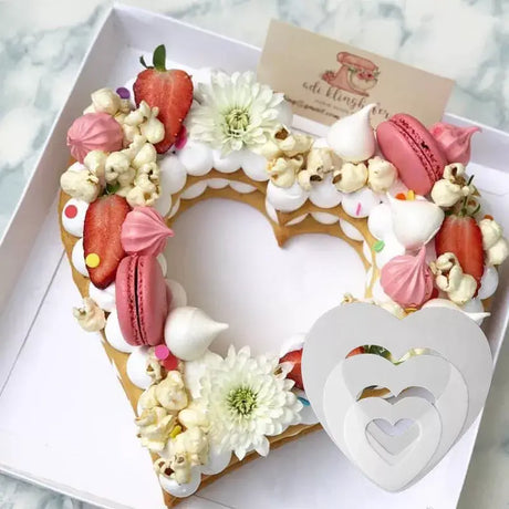 a heart shaped cake in a box