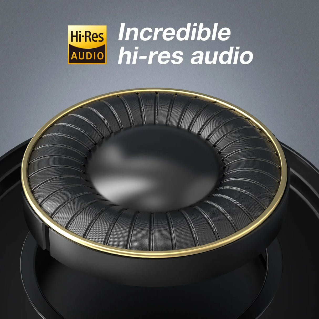 High-end audio speaker driver with a gold-rimmed diaphragm and ribbed surround.