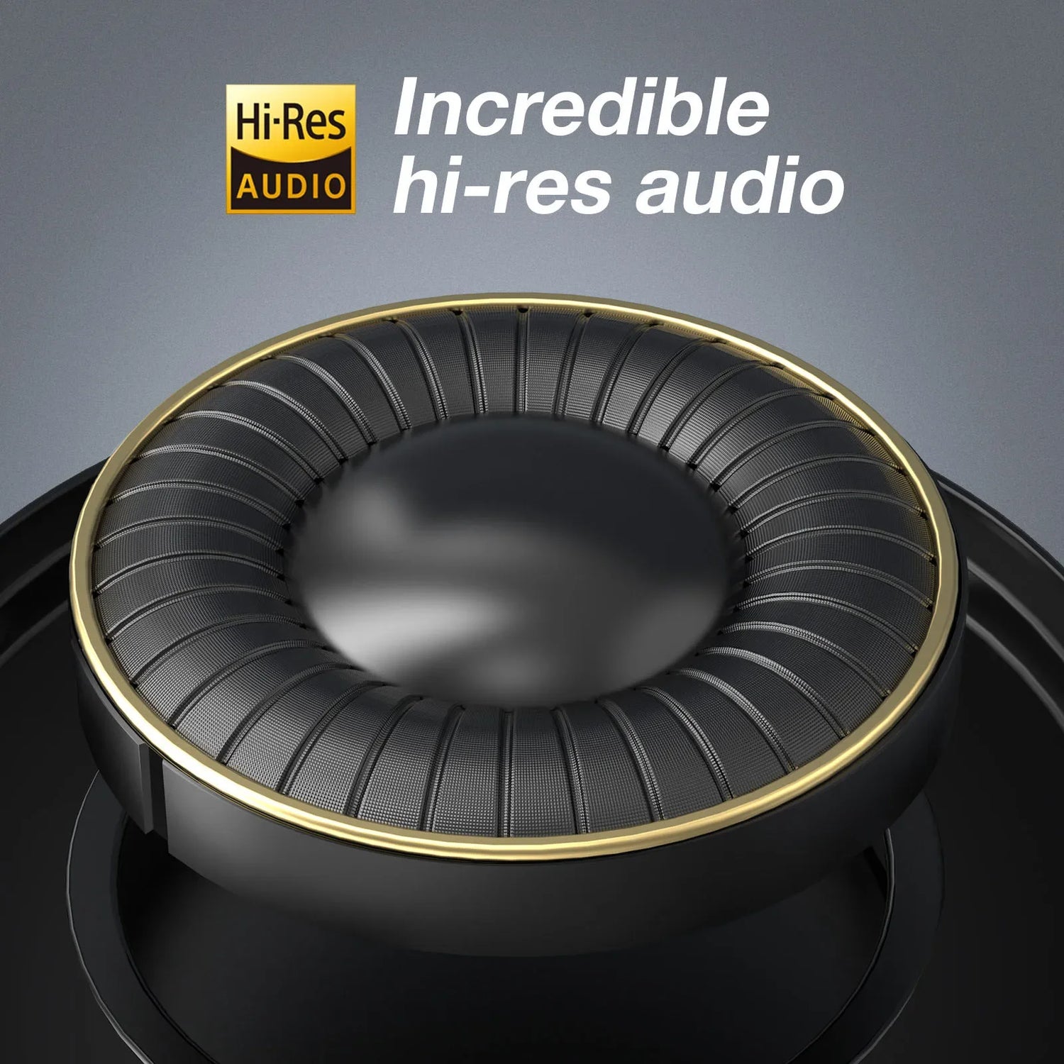 High-end audio speaker driver with a gold-rimmed diaphragm and ribbed surround.