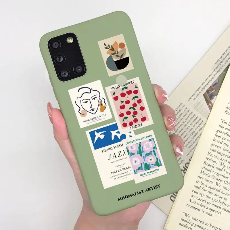 someone holding a green phone case with a picture of a woman’s face