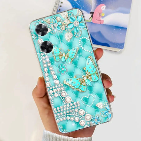 a woman holding a phone case with a blue and white pattern