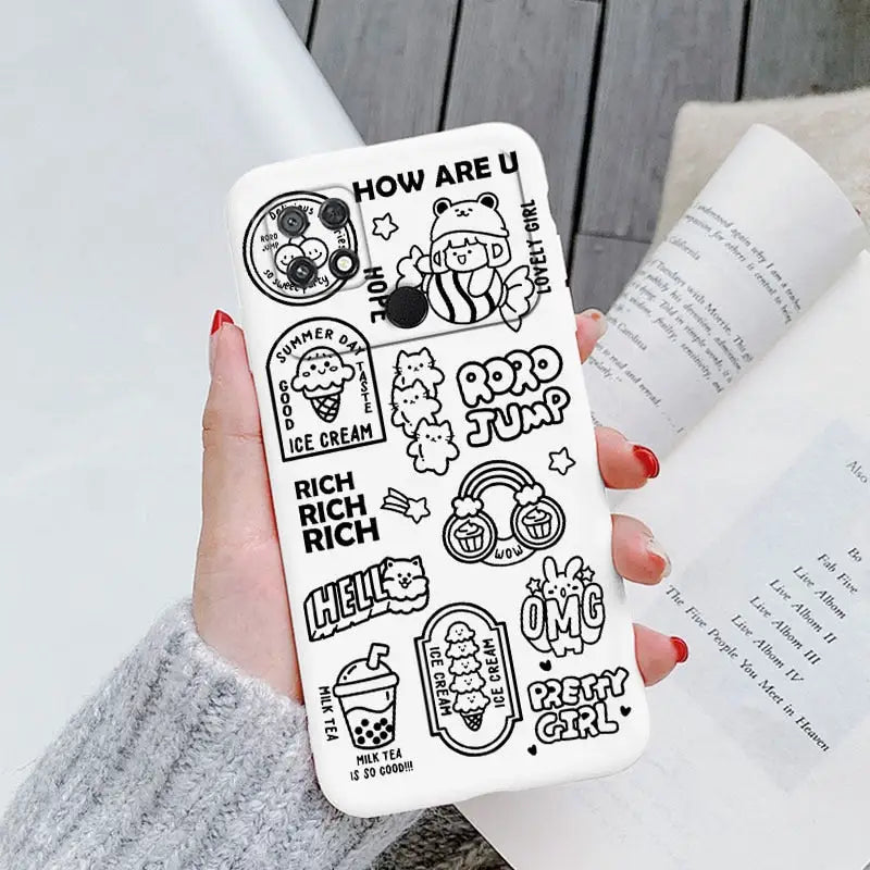 a woman holding a phone case with cartoon drawings on it