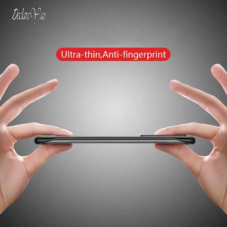 someone holding a phone with a red text on it