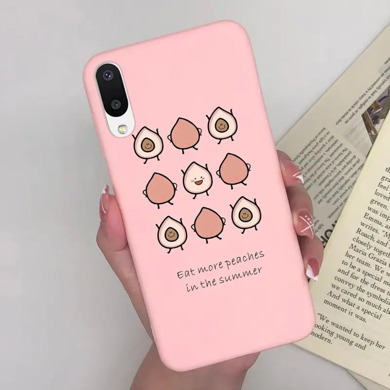 a pink phone case with a cartoon character on it
