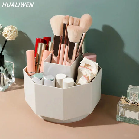 a white container with makeup brushes and other items