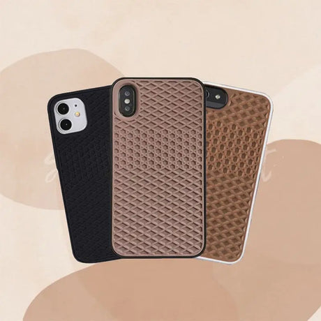 the iphone case is made from a brown and black leather
