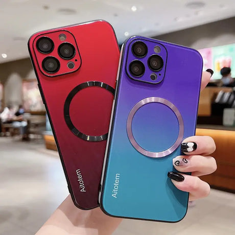 two iphone cases with a ring on the back