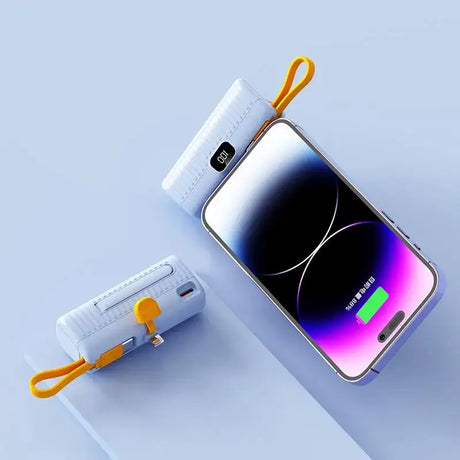 an iphone charging device with a charging cable attached to it