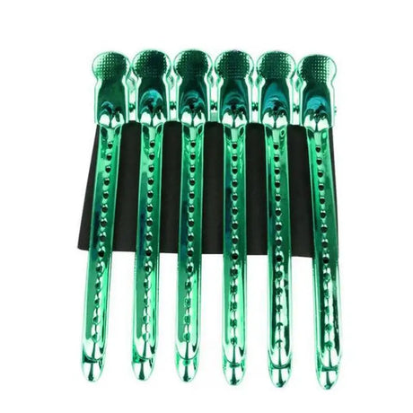 a set of green plastic forks with a black handle