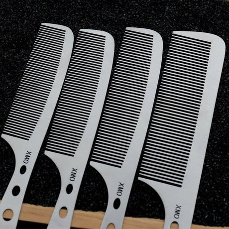 a set of combs with a black and white stripe