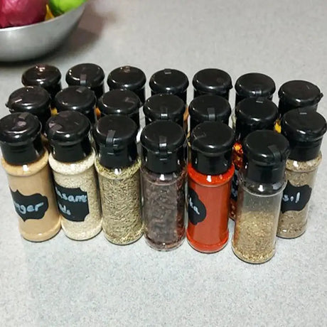 a bunch of spices sitting on a counter