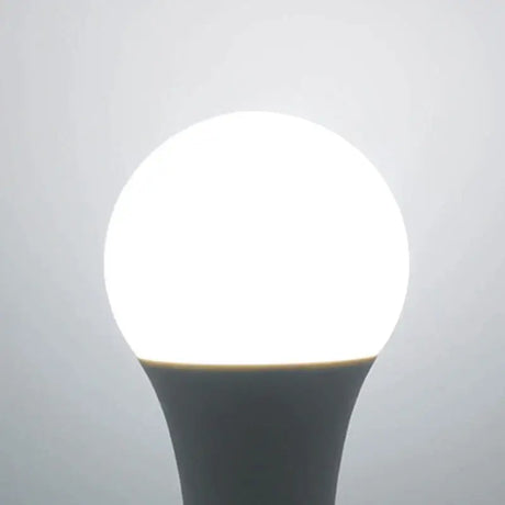 A light bulb with a white light on it