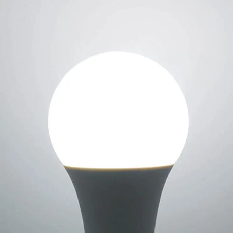a light bulb with a white light on it