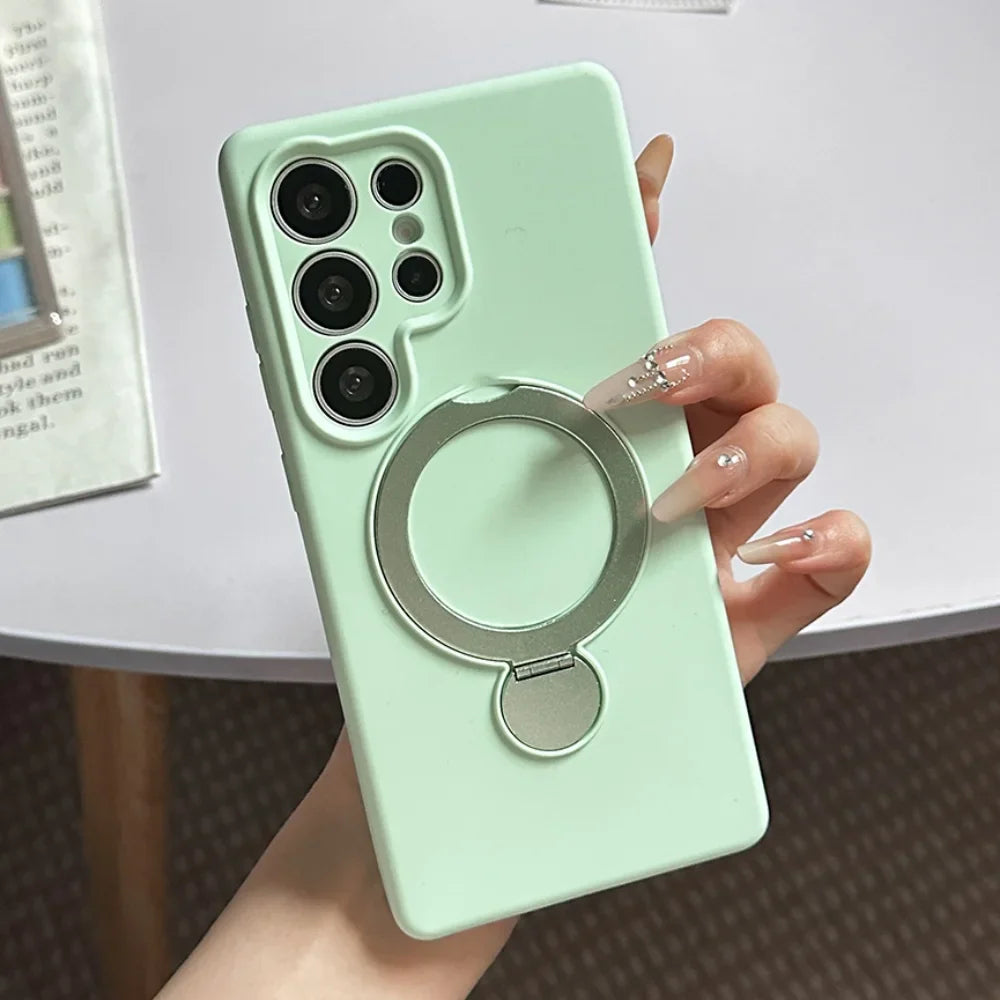 Light green phone case with a built-in silver ring holder.