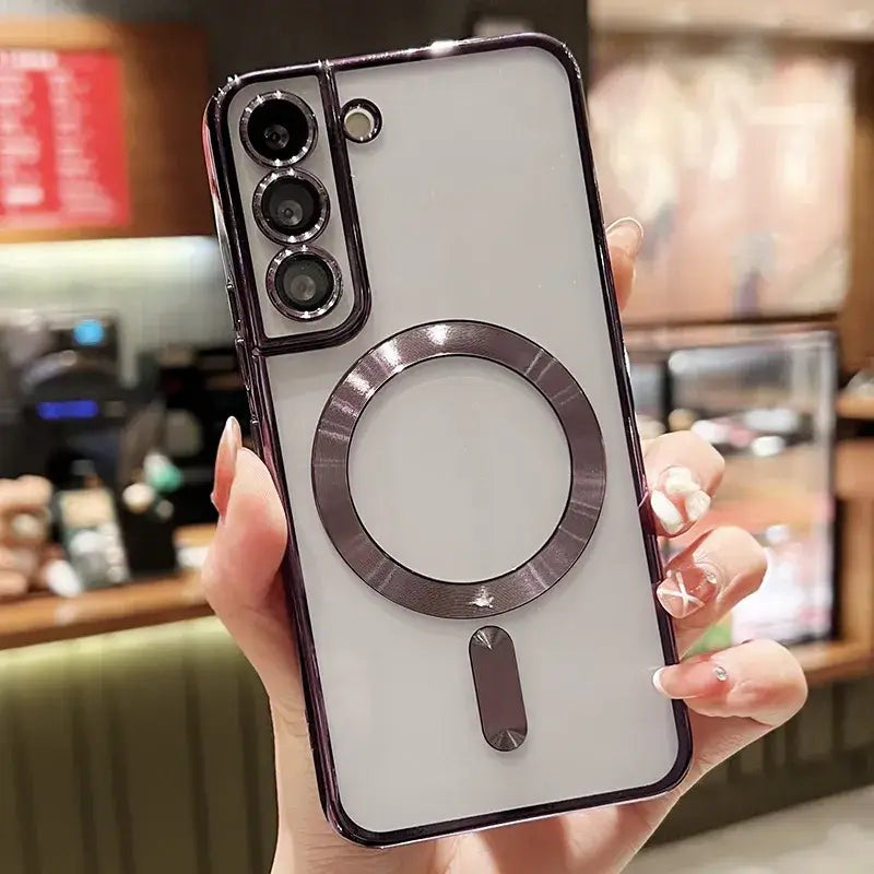 a woman holding a phone case with a ring on it