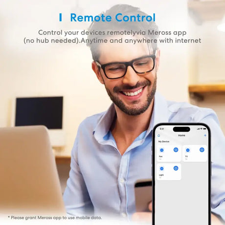 A man in glasses is using a phone