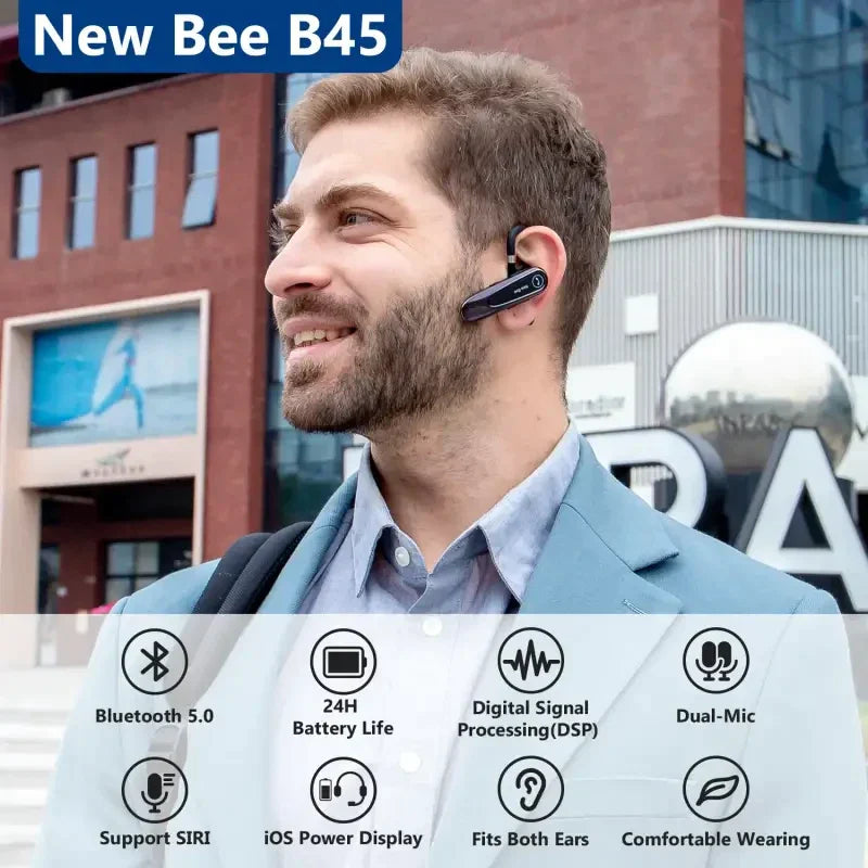 A man wearing a headset with the words new be - 5