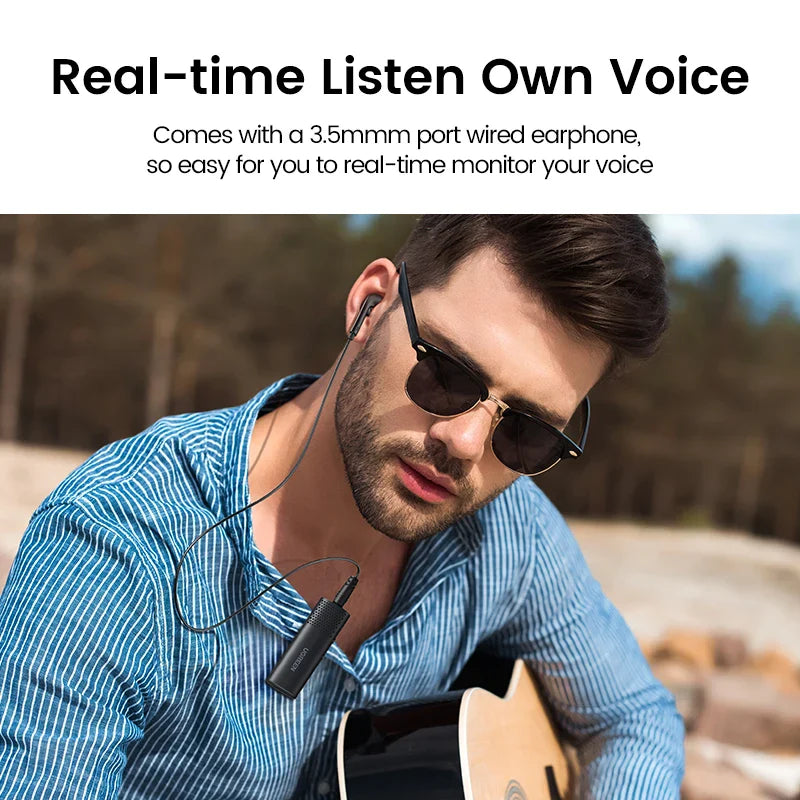 Man wearing sunglasses and a blue striped shirt, using earphones connected to a device.