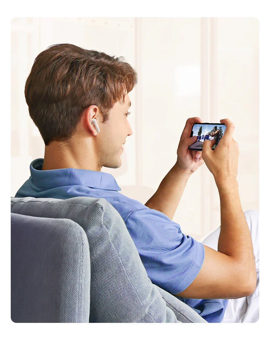 Man playing video game on smartphone.