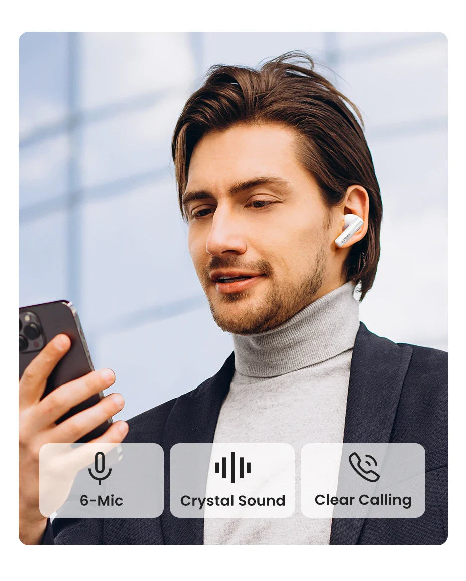 Man wearing wireless earbuds.