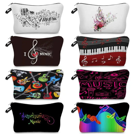 a set of four cosmetic bags with music notes and notes