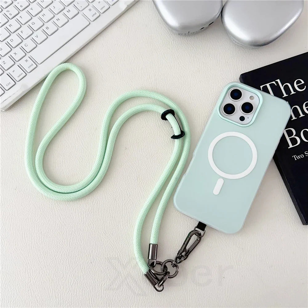 Mint green phone case with lanyard.