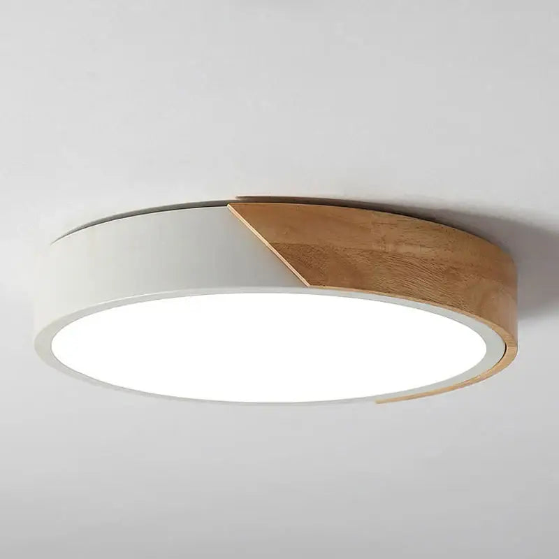 a white ceiling light with a wooden edge