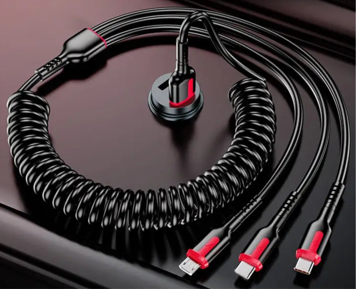 Multi-headed charging cable with a coiled section and red accents.