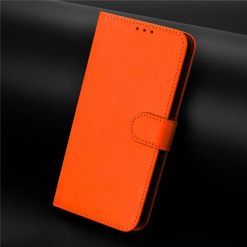 Orange faux leather flip phone case with a magnetic strap closure and three card slots.