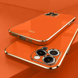 an orange iphone case with two lenses on top