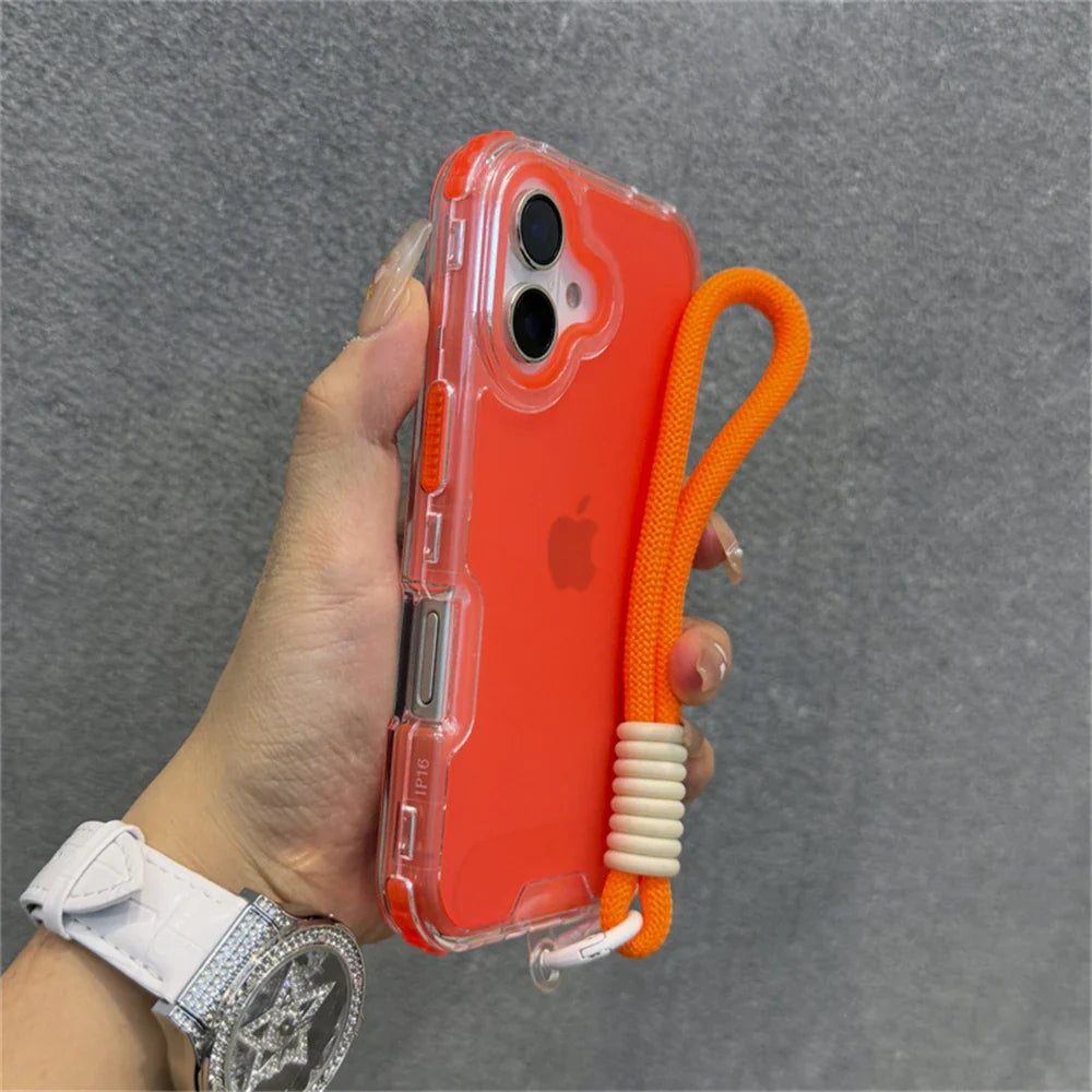 Orange iPhone in a clear case with a wrist strap.