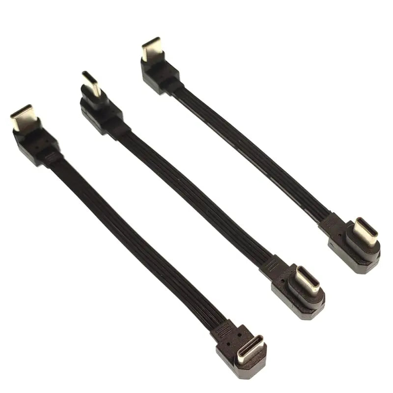 a pair of black cable connectors